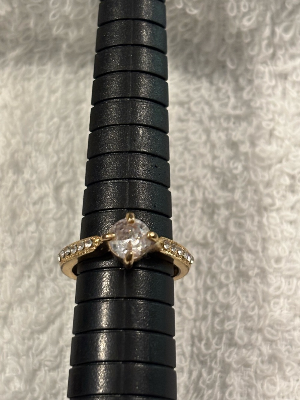 Gold tone Solitare ring with a center CZ and pave accent stones Sz 5.75
